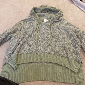 green cropped sweater